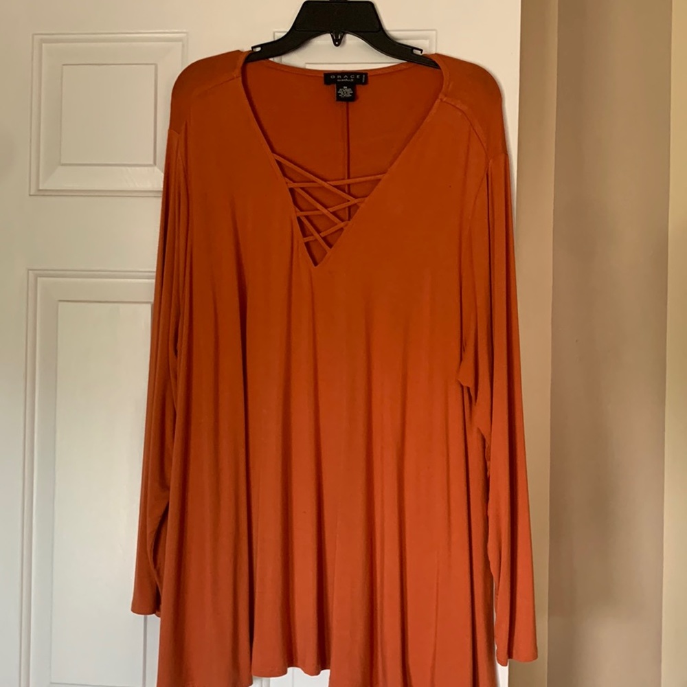 Long sleeve full and flowy tee with lattice v- neck